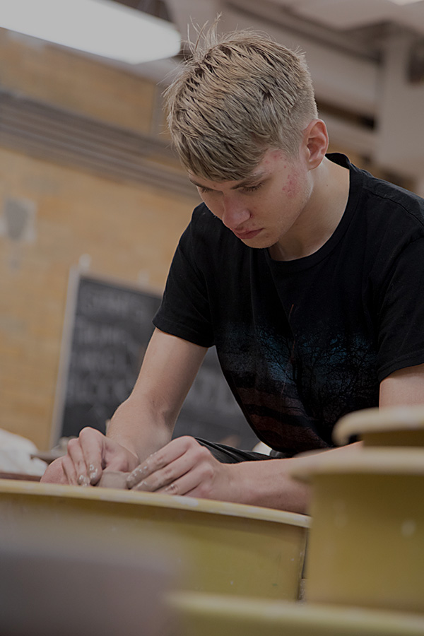 Photograph of Baltimore School for the Arts student working with clay